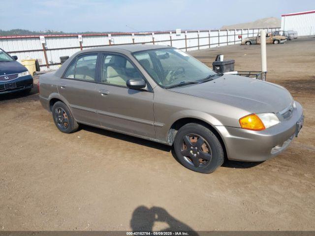  Salvage Mazda Protege